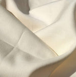 60" PFD 100% Lyocell Tencel Gabardine Twill Ivory Woven Fabric