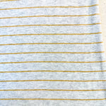 Beige and yellow striped cotton jersey knit fabric detail
