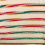Yellow and green striped cotton jersey knit fabric detail