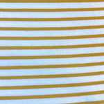 Yellow and white striped cotton jersey knit fabric detail