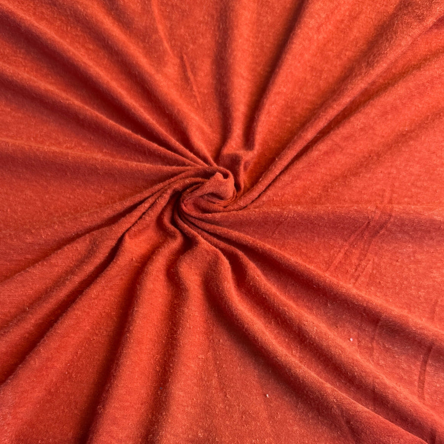 Orange red nep slub knit fabric