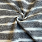 Faded gray and white striped french terry knit fabric