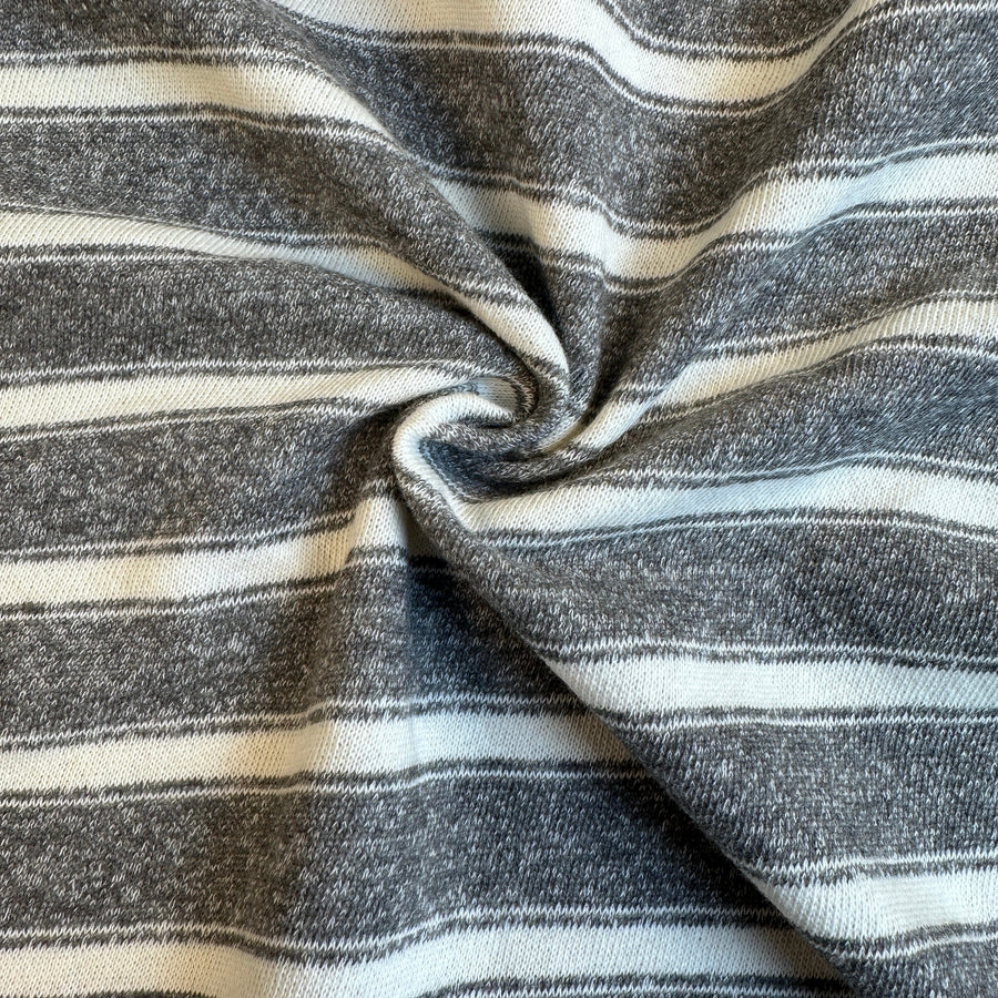 Faded gray and white striped french terry knit fabric
