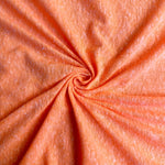 Orange nep jersey knit fabric
