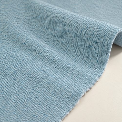 Styled product photograph of Ice Blue French Terry Knit Fabric, 50% Polyester 50% Cotton 16 oz, Sweatshirt Hoodie Jogger Fabric, Sold by the Yard; original photographs follow.