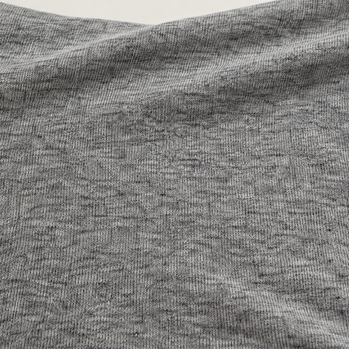Styled product photograph of Heather Gray Cotton Jersey Rayon Knit Fabric, 100% Cotton 16/1 12 oz Midweight, Premium Tee Fabric, Sold by the Yard; original photographs follow.