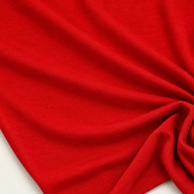 Styled product photograph of Red Poly Cotton Knit Fabric, 50% Polyester 50% Cotton, Team Apparel Tee Craft Fabric, Sold by the Yard; original photographs follow.