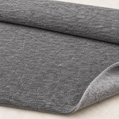 Styled product photograph of Heather Gray Cotton Fleece Fabric, 90% Cotton 10% Polyester, Sweatshirt Fleece Hoodie Fabric, Sold by the Yard. Original fabric photos follow.