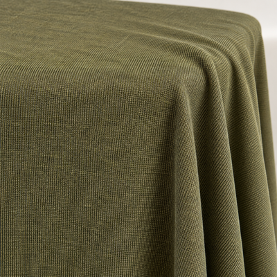 Styled product photograph of Dark Green Polyester Knit Fabric, 100% Polyester Solid Stretch, Activewear Legging Fabric, Sold by the Yard; original photographs follow.