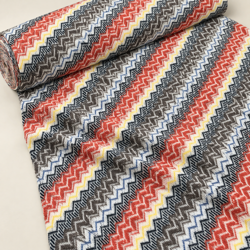Styled product photograph of 58" 100% Cotton Chevron Zigzag Laundered Multicolor Knit Fabric; original photographs follow.
