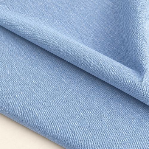 Styled product photograph of 60" 100% Cotton Chambray Baby Blue 8 OZ Medium Weight Woven Fabric; original photographs follow.