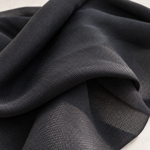 56" 100% Rayon Georgette Solid Black Medium Weight Woven Fabric — styled fabric photograph