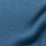 Blue — enzyme-washed Tencel Lyocell Gabardine — styled fabric photograph