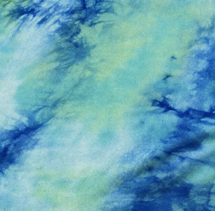 60" Modal & Spandex Stretch Tie Dyed Blue Green Jersey Knit Fabric — styled fabric photograph