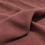 Brown — enzyme-washed Tencel Lyocell Gabardine — styled fabric photograph