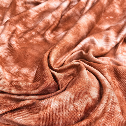 62" Brown & White Tie Dye Modal Stretch Blend Jersey Knit Fabric By the Yard — styled fabric photograph