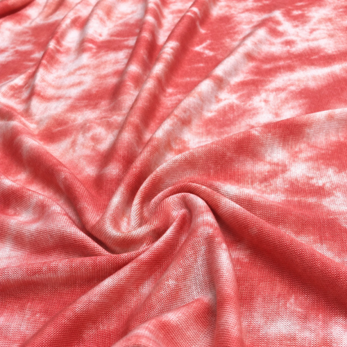 64" Tie Dyed Modal Spandex Pink Orange & White Jersey Knit Fabric — styled fabric photograph
