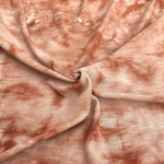 64" Cream Brown & White 100% Poly Light Jersey Knit Fabric By the Yard — styled fabric photograph