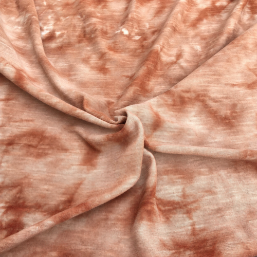 64" Cream Brown & White 100% Poly Light Jersey Knit Fabric By the Yard — styled fabric photograph