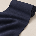 Dark Blue — enzyme-washed Tencel Lyocell Gabardine — styled fabric photograph