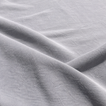 Gray — enzyme-washed Tencel Lyocell Gabardine — styled fabric photograph