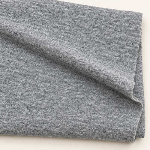 Heather Gray Cotton Jersey Knit Fabric, 90% Cotton 10% Polyester, Soft Drapey T-Shirt Apparel Fabric, Sold by the Yard — styled fabric photograph
