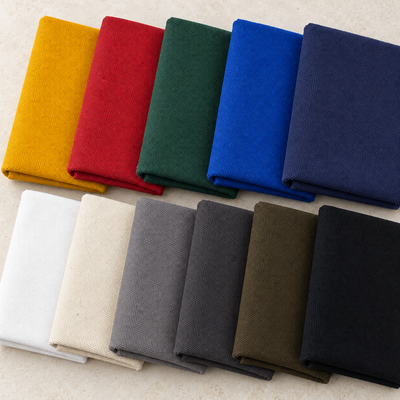 Cotton Duck Canvas Fabric by the Yard | 10 Colors, 18 oz Heavyweight | Canvas for Bags Aprons Upholstery Workwear — styled photograph based on the original fabric images