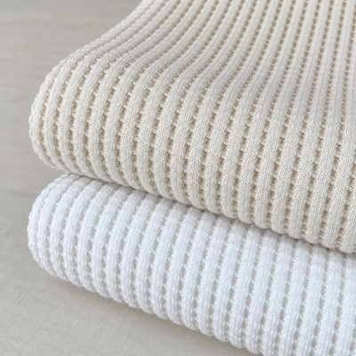 Super Heavyweight Cotton Tencel Premium Waffle Thermal Fabric - 675 GSM, 33 oz, By The Yard — styled photograph based on the original fabric images