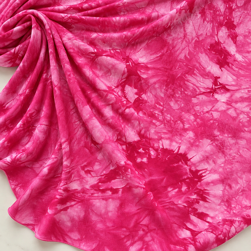 60" Bamboo 4-Way Stretch Spandex Tie Dye Jersey Knit Fabric — styled fabric photograph