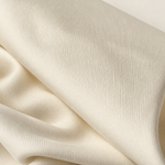 60" PFD Ivory 100% Lyocell Tencel Gabardine Twill Woven Fabric By the Yard — styled fabric photograph