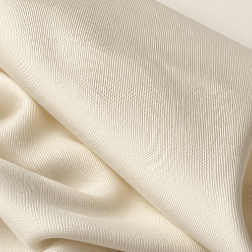 60" PFD Ivory 100% Lyocell Tencel Gabardine Twill Woven Fabric By the Yard — styled fabric photograph
