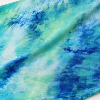 Modal Spandex Stretch Tie Dye Jersey Knit Fabric, Blue Green White — styled fabric photograph