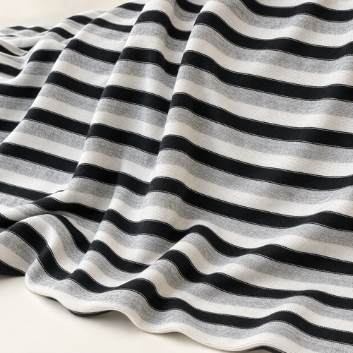 Striped Cotton Jersey Knit Fabric, Black and Gray and White Stripe, 60% Cotton 40% Polyester 123 GSM, Soft Drapey Apparel Fabric, Sold by the Yard — styled fabric photograph