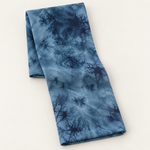 Navy Teal bamboo spandex tie-dye jersey knit fabric, styled product photo
