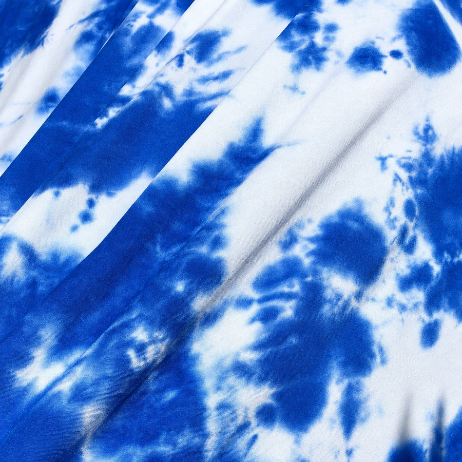60” Modal & Spandex Lycra Stretch Tie Dyed Ocean Blue & White Apparel and Face Mask Jersey Knit Fabric By the Yard — styled fabric photograph