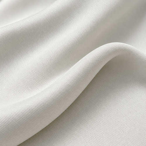 58" Rayon Stretch Gabardine with Spandex 8 OZ Off White Woven Fabric — styled fabric photograph