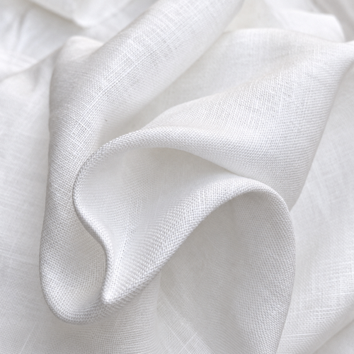 58" 100% Linen Flax 6 OZ Optic White & Black Light Woven Fabric — styled fabric photograph