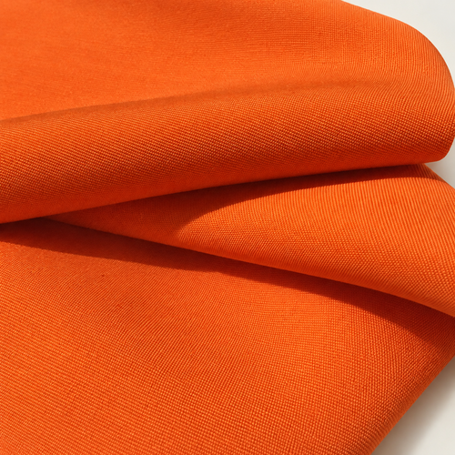 58" Rayon Faille Blitz Bright Orange Light Weight Woven Fabric — styled fabric photograph
