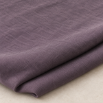 Purple — enzyme-washed Tencel Lyocell Gabardine — styled fabric photograph