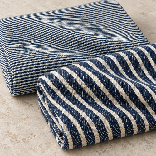 Indigo cotton railroad denim showing both thin and thick stripe patterns