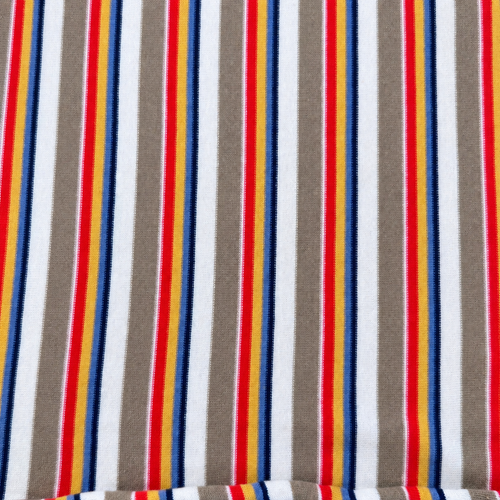 Striped Cotton Jersey Knit Fabric, Red and Yellow and White and Beige and Blue Stripe, 65% Cotton 35% Polyester 147 GSM, Sold by the Yard — styled fabric photograph