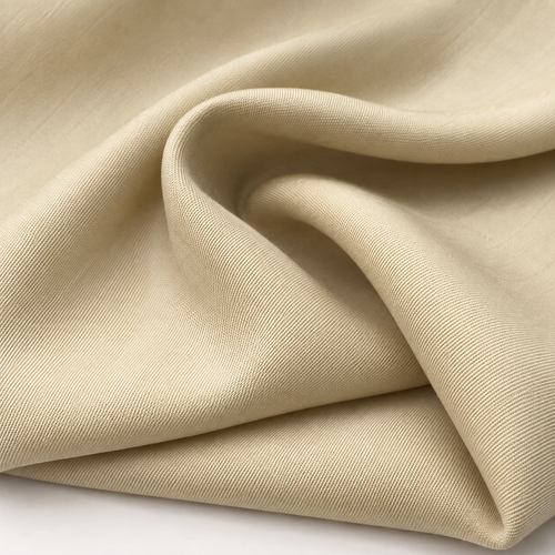 60" Beige 100% Lyocell Tencel Gabardine Twill Woven Fabric — styled fabric photograph