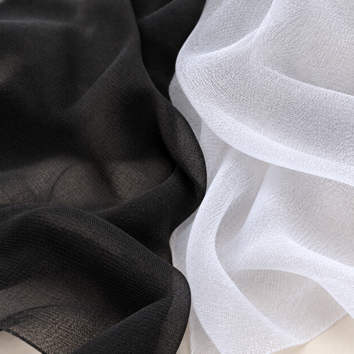 54" Black 100% Lyocell Tencel Georgette Light Sheer Woven Fabric By — both color options, styled fabric photograph