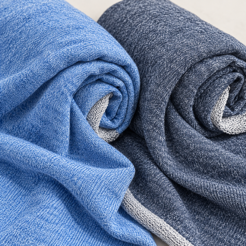 58" Three End Fleece Cotton Baby Blue & Navy Blue Knit Fabric — styled fabric photograph