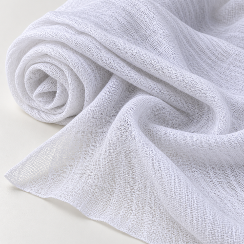 56" 100% Cotton Gauze Wrinkly Off White Ivory Knit Fabric By the Yard — styled fabric photograph