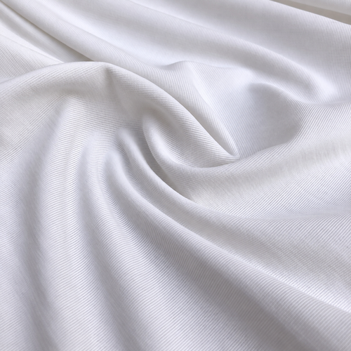 54" Solid White Nylon Spandex Lycra Stretch Blend Jersey Knit Fabric — styled fabric photograph