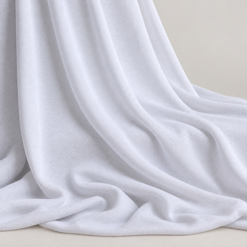 62" White Polyester Spandex Jersey Knit Fabric By the Yard — styled fabric photograph