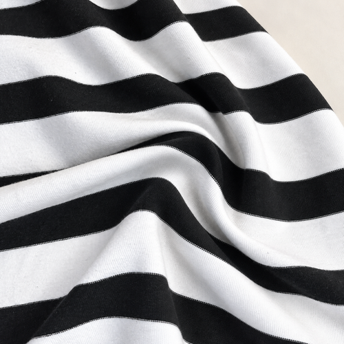 Striped Cotton Jersey Knit Fabric, Black and White Stripe, 90% Cotton 10% Polyester 257 GSM, Soft Drapey Apparel Fabric, Sold by the Yard — styled fabric photograph