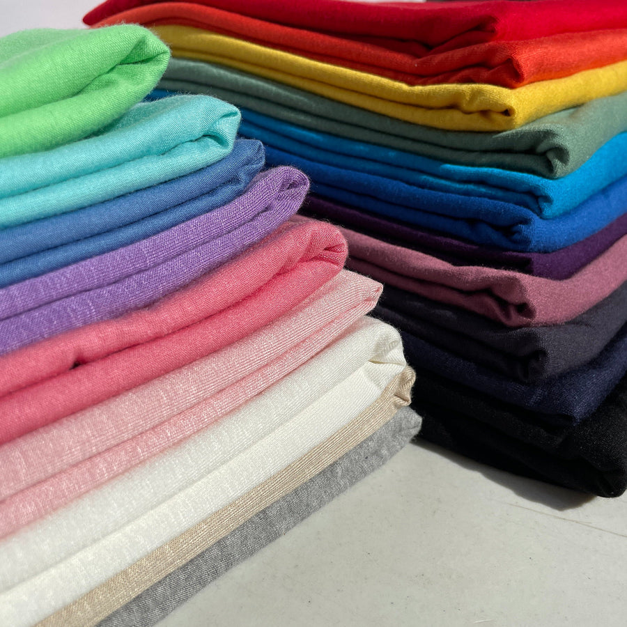 60” Bamboo & Rayon 4-Way Stretch with Spandex Solid Jersey Knit Fabric By the Yard | APC Fabrics